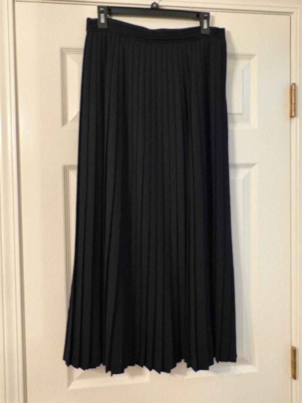 Evan Picone, pleated black wool skirt, size 12.